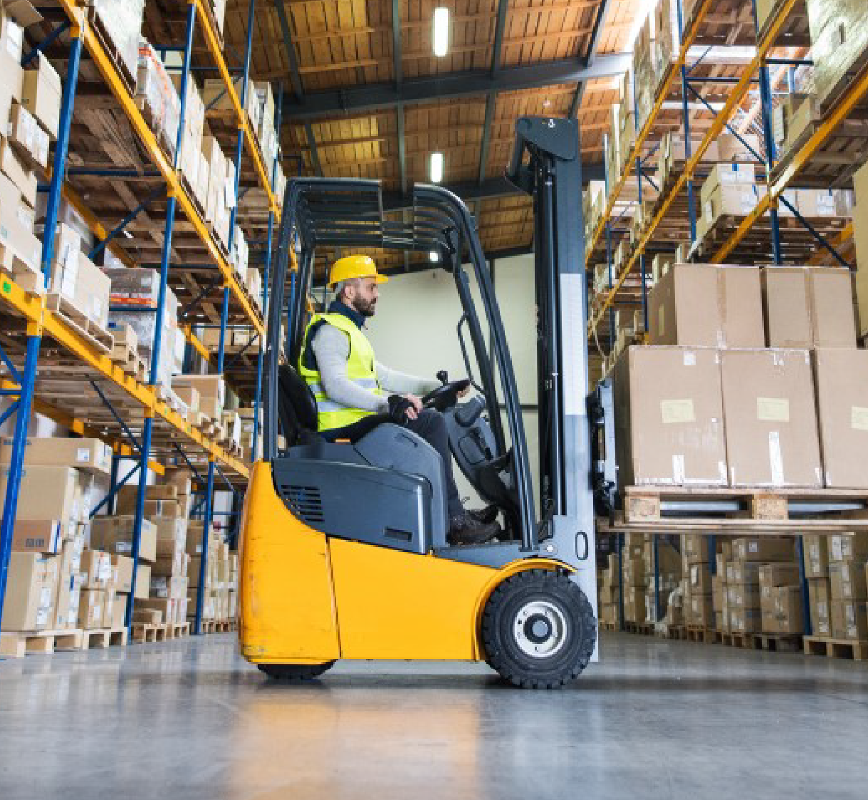 yellow forklift in warehouse